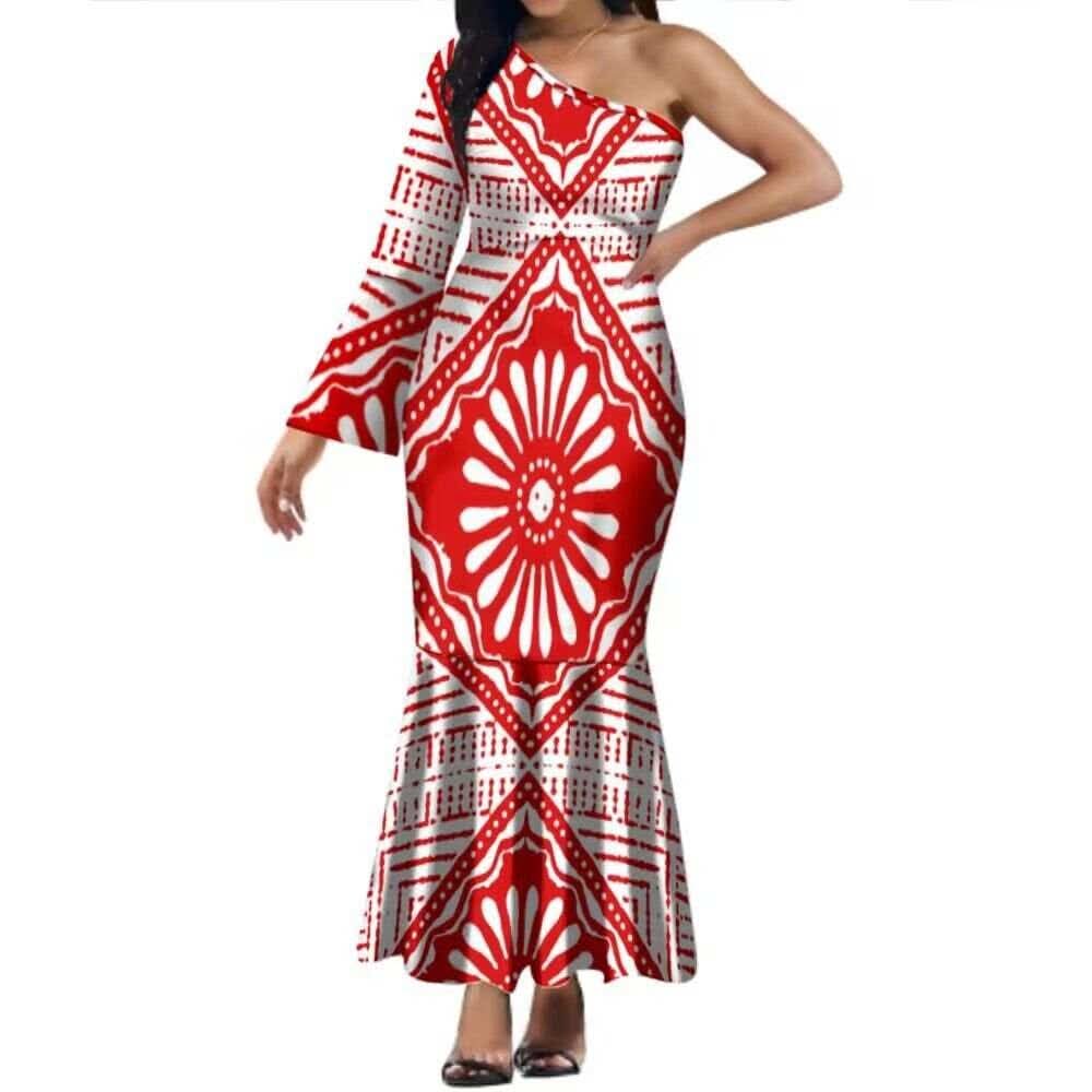Robe longue motif tapa  une  manche.